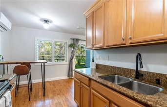 Building Photo - Executive Bixby Village condo with gorgeou...
