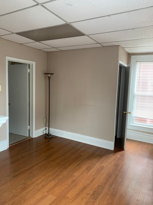 Living room unit 3 - 128 W 2nd St
