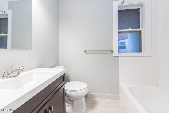 Building Photo - 1387 W 69th St