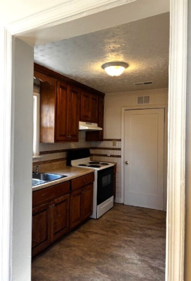 Building Photo - Price Reduced for March Move in