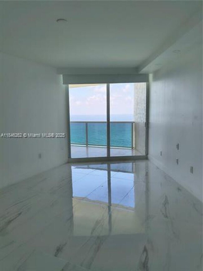 Building Photo - 19111 Collins Ave