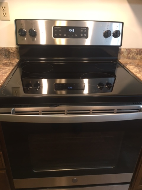 New electric stove - 201 Huntington Rd