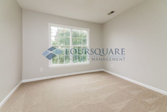 Building Photo - Spacious 4-Bed Home with Double-Height Cei...