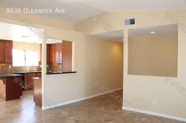 Building Photo - 8636 Oleander Ave