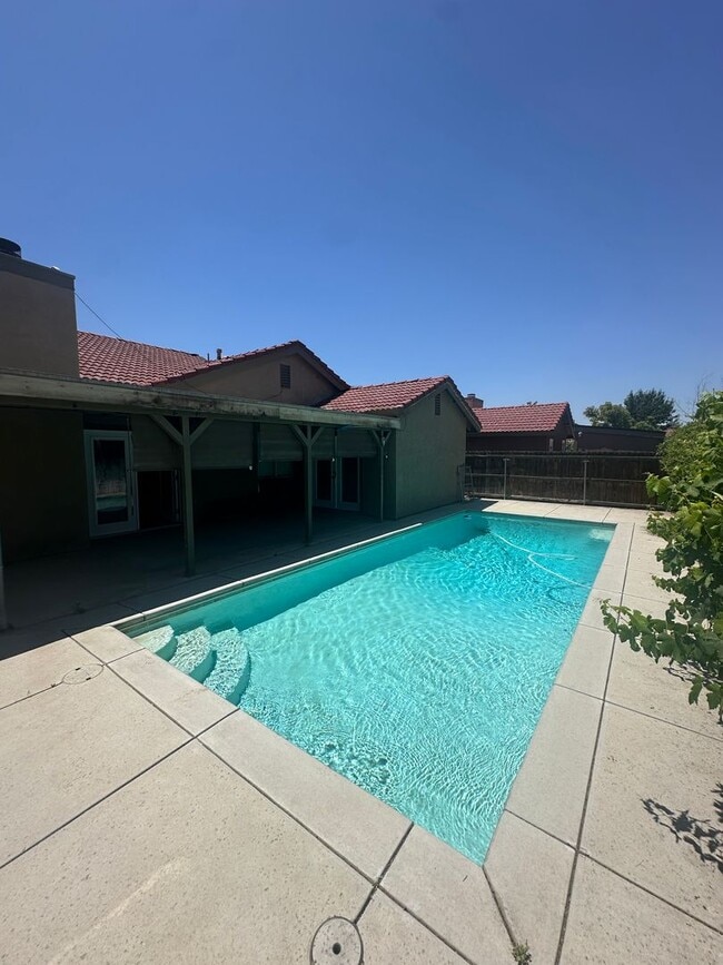 Building Photo - Spacious 4-Bedroom Home with Pool