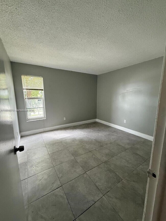 Building Photo - 2800 NW 56th Ave