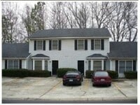 Building Photo - NOW AVAILABLE! Charming 2-Bedroom, 2-Bathroom Single-Level Townhome