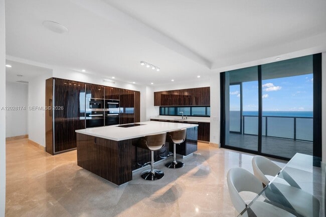 Building Photo - 18555 Collins Ave