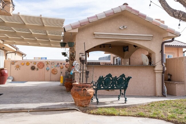 Building Photo - Desert Oasis – Furnished Executive Room in...