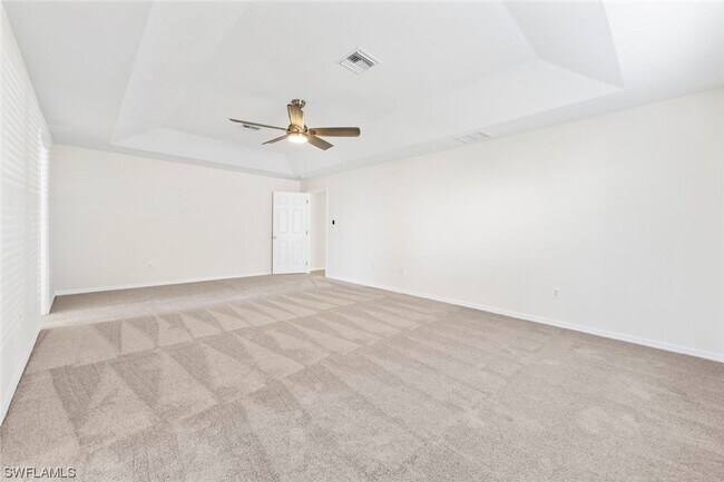 Building Photo - 4BR Home in Gated Town Lakes Community with Lake View