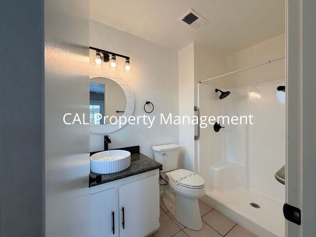 Building Photo - Spacious 4-Bedroom Home with 2-Car Garage & Backyard Oasis