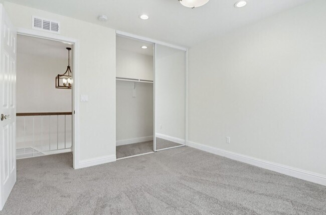 Building Photo - Stunning Upgraded 4BR Home with Pool in Desirable Rancho San Diego – Move-In Ready