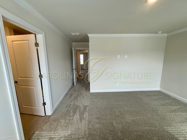 Building Photo - Beautiful New Construction Townhome in Uni...