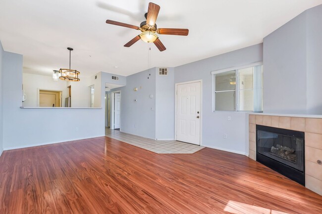 Building Photo - Modern Ground-Level Condo With A One Car Garage in Prime Southwest Location with Resort-Style Ame...