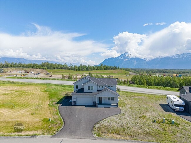 Building Photo - Premium 4BR Rental in The Ranch | Stunning Mountain Views | Easy Community Location | Automatic G...