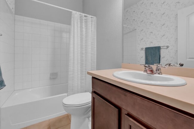 Building Photo - Beautiful low-maintenance ranch home with turf in front and back!