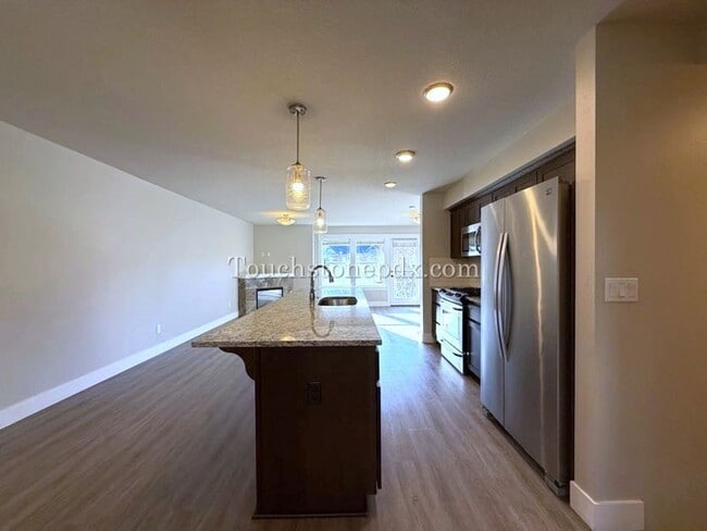 Building Photo - Modern Open Concept 3 Bedroom Home with Balcony and Attached Garage
