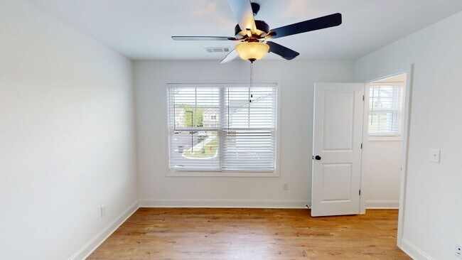 Building Photo - Charming Two Bedroom Townhomes With Flex R...