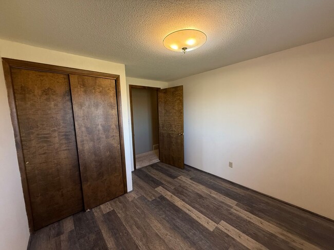 Building Photo - Spacious, four-bedroom, two-bathroom, country home, with two car attached garage, and more!