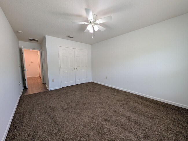 Building Photo - NOW AVAILABLE - 3/2 Duplex on this 12 mo Lease - Conveniently located off Lewis Speedway near St ...