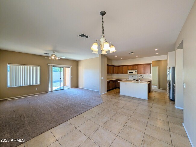 Building Photo - 16071 W Gelding Dr