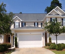Building Photo - BRAND NEW FLOORING & FRESH PAINT - 3 Bedroom/2.5 Bath Townhome with garage in Wild Wing!