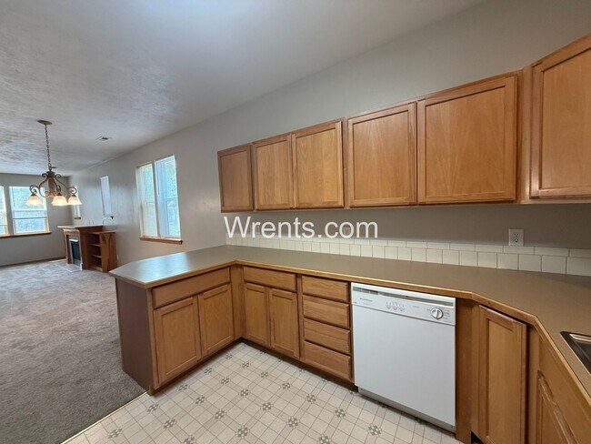 Building Photo - COMING SOON! South Hill Duplex with Garage & Utilities Included!