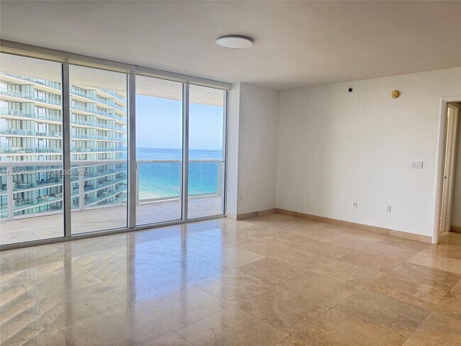 Building Photo - 18911 Collins Ave
