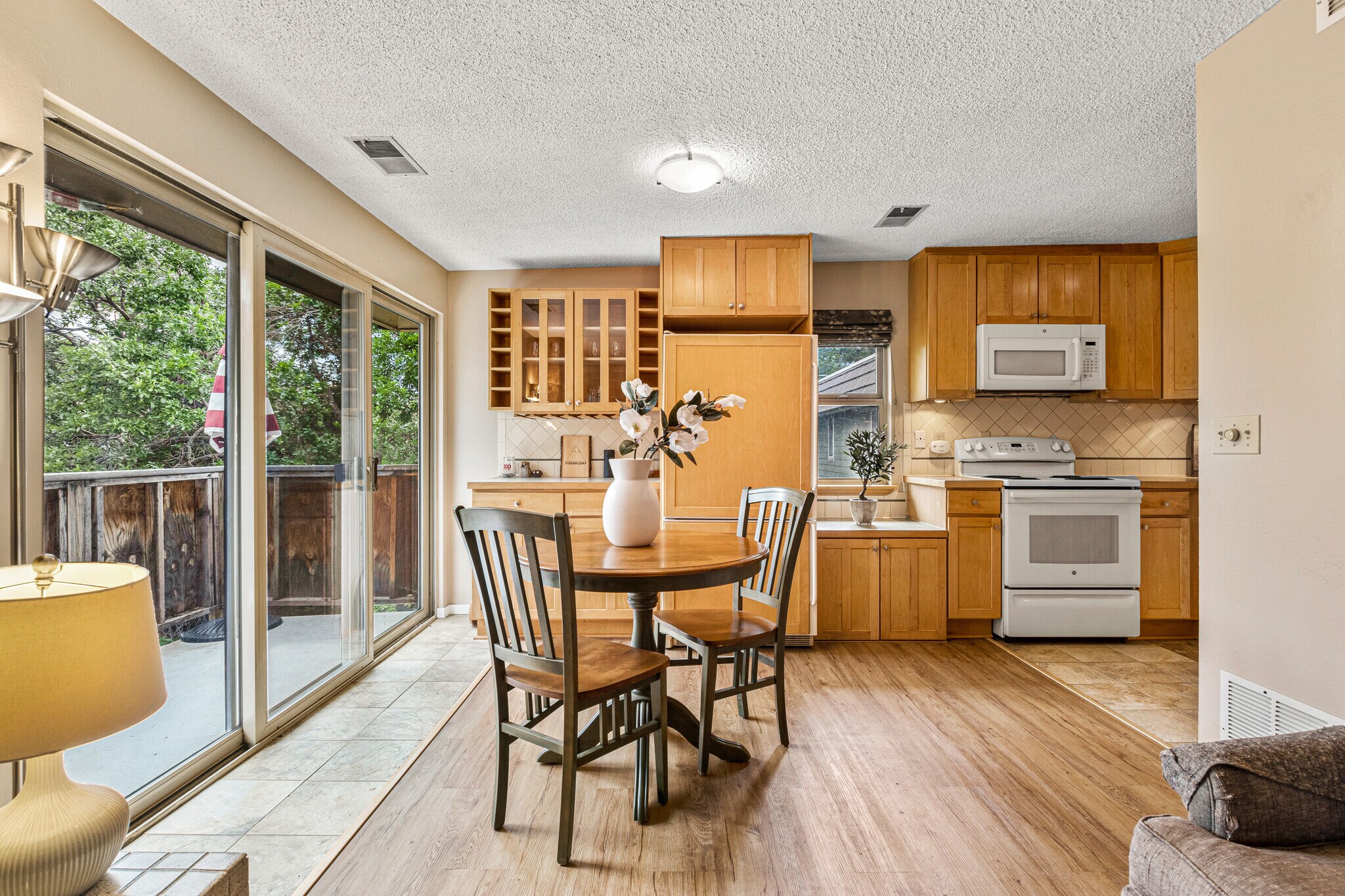 kitchen and dining room - 3365 Chisholm Trl