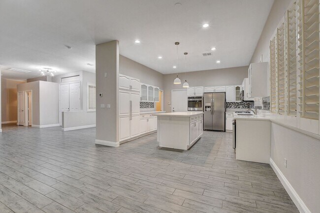 Building Photo - 4 bedroom, 3-bath home with a Pool!