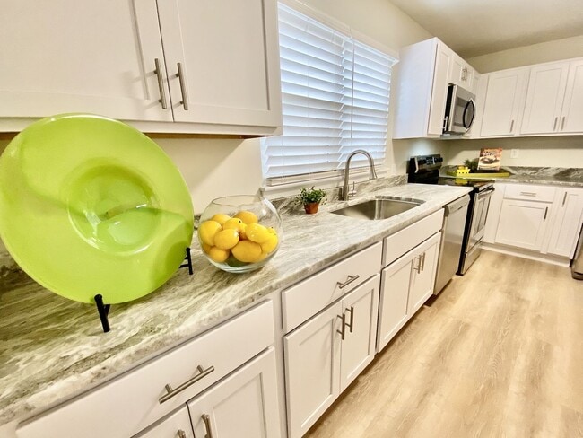 Building Photo - Ready 02-23-26!! Reserved Parking, Pet Friendly - Centrally Located Near Several Bases & Intersta...