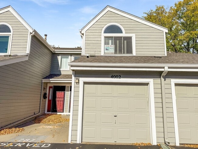 Building Photo - $0 DEPOSIT OPTION. CHARMING TWO-STORY TOWNHOUSE WITH FINISHED BASEMENT, GARAGE, AND HOA AMENITIES...