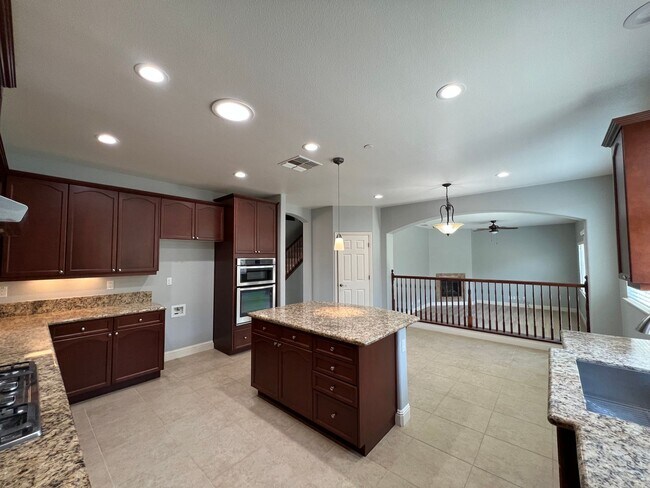 Building Photo - Desirable and Spacious 5-Bedroom Home in Empire Ranch!
