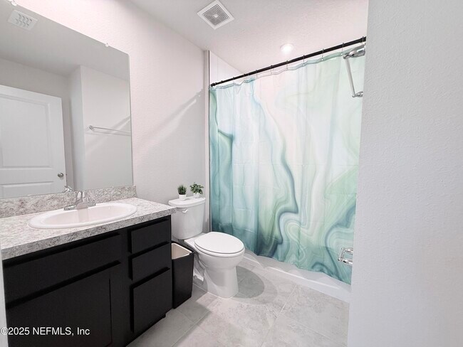 Building Photo - 5885 Creekside Crossing Dr