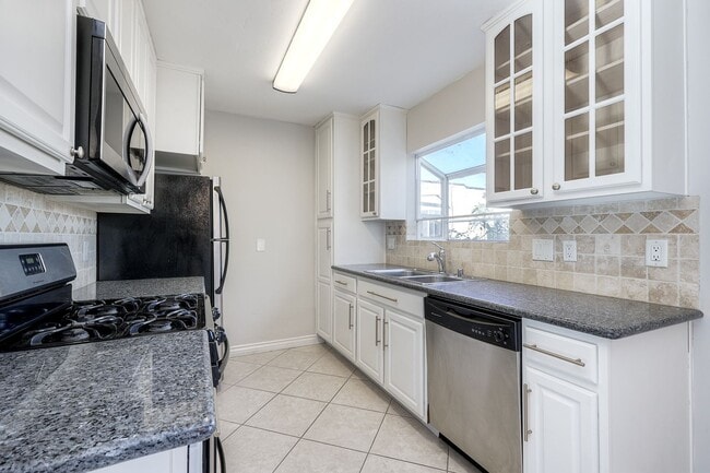 Building Photo - San Diego City Heights Upstairs Condo Two Weeks FREE  in Beautiful Gated Complex- Available Now