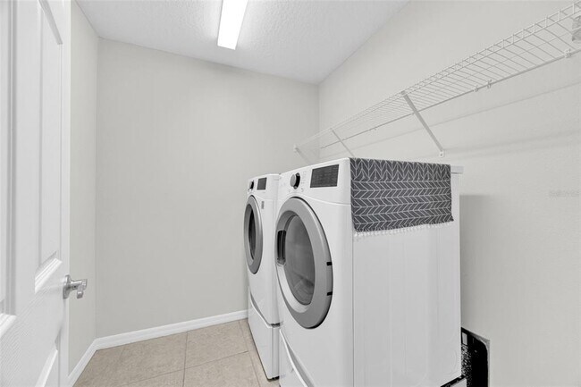 Building Photo - 6321 Tillandsia Pl