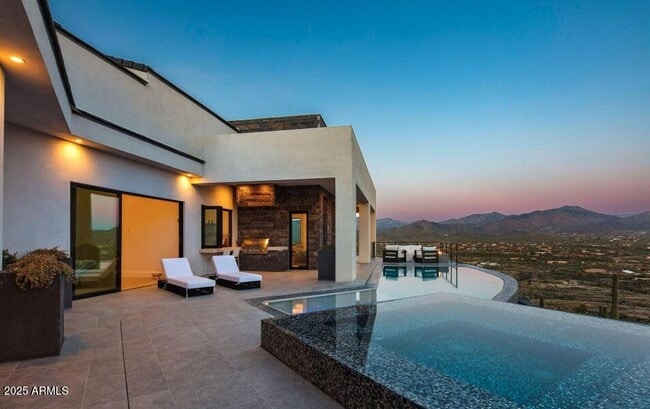 Building Photo - 4880 E Lone Mountain Rd N