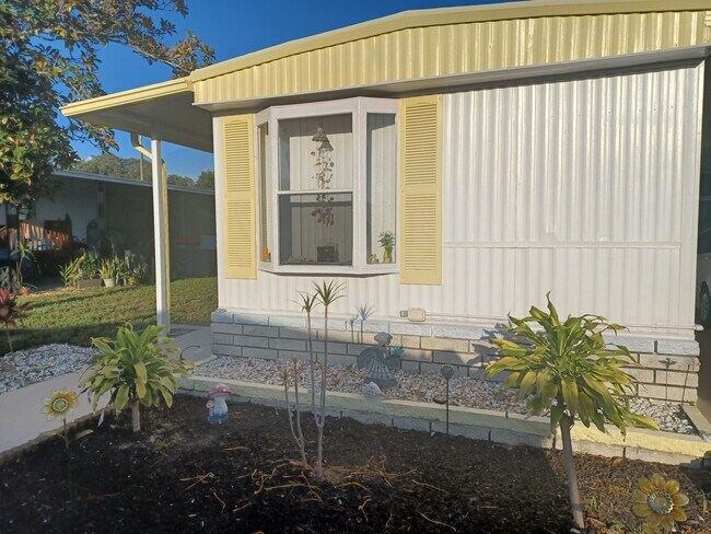 FRONT OF HOME - NEW PAINT - 7325 Demure Ln