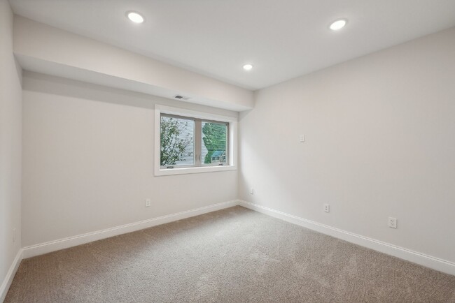 Building Photo - "NEW CONSTRUCTION Urban Living: Spacious 4...