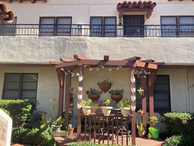 Building Photo - Spanish Garden Style Apartment Community