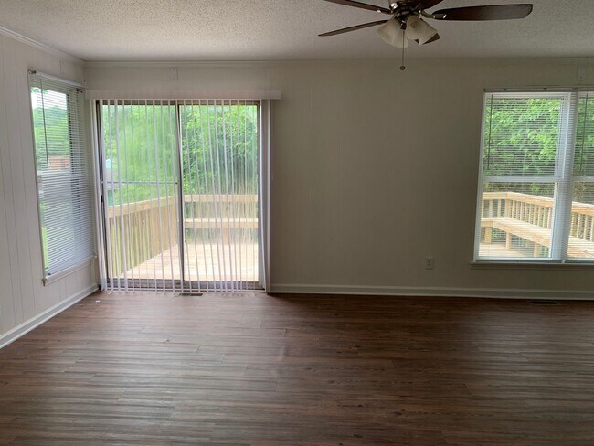 Building Photo - 3 bedroom & office -2 baths -2 car carport - washer/dryer hook ups - Den and formal living room- ...