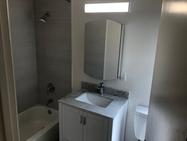Building Photo - Remodeled top floor rent controlled apartm...