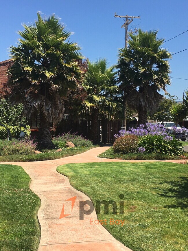 Building Photo - Bright Industrial-Style Loft in a Converte...