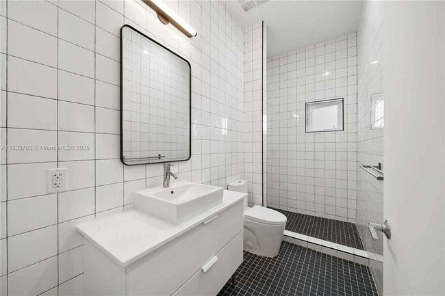 Building Photo - Northwest 9th Court, Miami, FL 33127 - 5 BR 3 BA townhouse