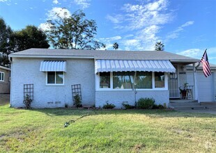 Building Photo - Two Bedroom Home with Garage and Yard For ...