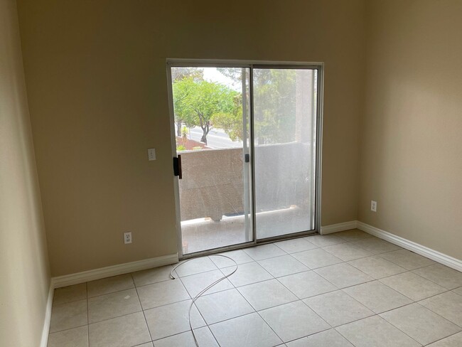 Building Photo - Spacious Condo with Loft & 2-Car Garage – Minutes from the Strip!