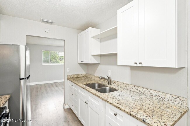 Building Photo - 6790 Tinkerbell Ln