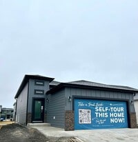 Building Photo - Spacious & Stylish 4-Bed Home with Modern Finishes and Attached 2-Stall Garage