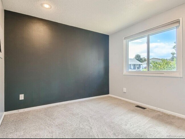 Building Photo - 1293 E 97th Ave