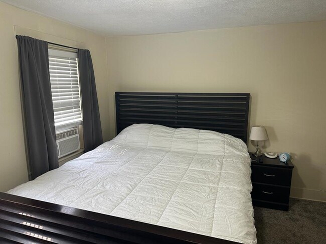 Master Bedroom, king bed - 1724 Center Ave NE